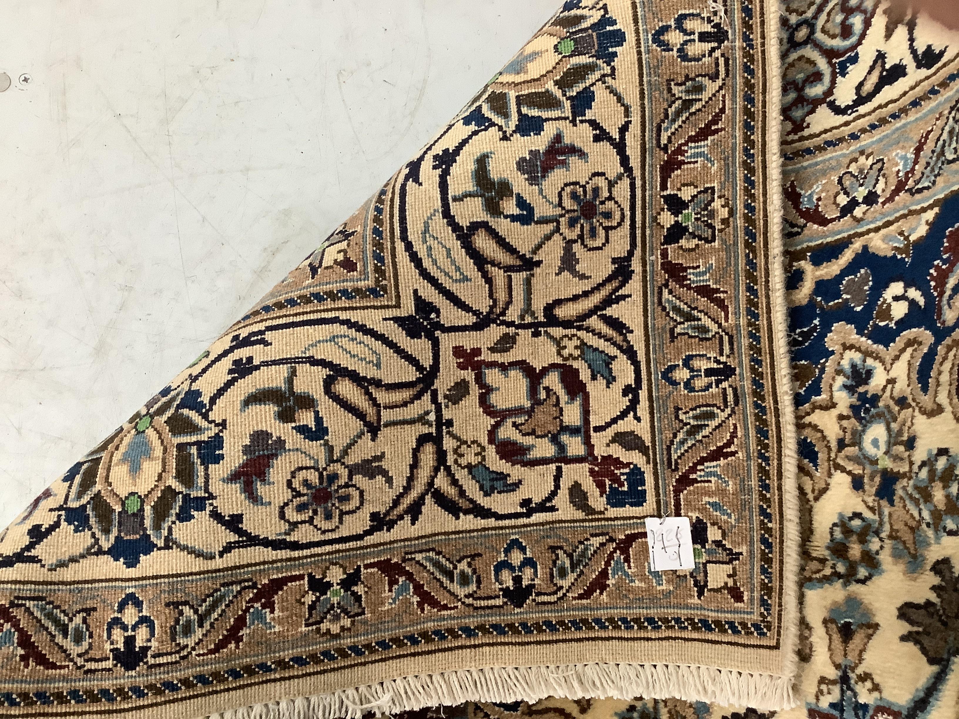 A fine Nain ivory ground carpet, 290 x 191cm